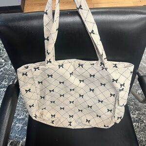 Elegant Cream Tote Bag with Black Accents